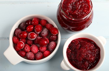 Image showing Cranberries and cranberry jam.