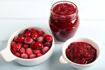 Image showing Cranberries and cranberry jam.