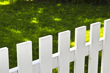 Image showing Front yard with white fence