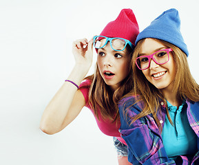 Image showing best friends teenage girls together having fun, posing emotional on white background, besties happy smiling, lifestyle people concept close up