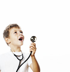 Image showing little cute boy with stethoscope playing like adult profession d