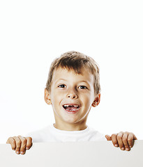 Image showing little cute boy holding empty shit to copyspace isolated close u