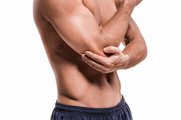 Image showing Man With Pain In Elbow. Pain relief concept