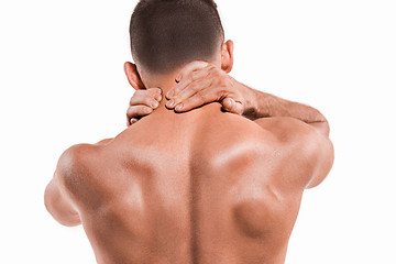 Image showing Studio shot of man with pain in neck