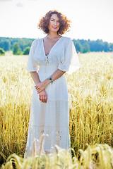 Image showing charming woman dressed in white