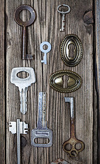 Image showing Set of vintage keys and keyholes