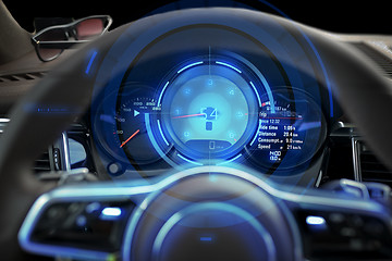 Image showing close up of car dashboard and steering wheel