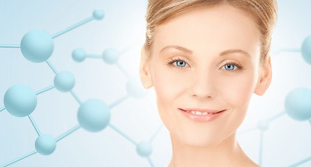 Image showing beautiful young woman face with molecules