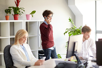 Image showing business team with smartphones at office