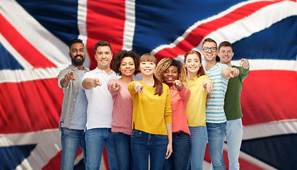 Image showing international group of people pointing on you