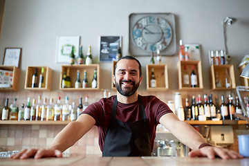 Image showing happy man or waiter at bar or coffee shop