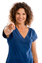 Image showing Happy mature woman pointing