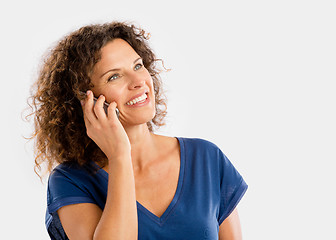 Image showing Happy woman talking at phone