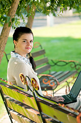 Image showing Business woman in summer park
