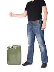 Image showing Man opening jerry can. 