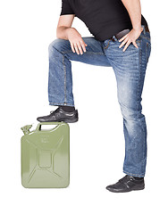 Image showing Man opening jerry can. 