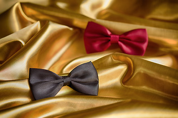 Image showing Red and black bow ties