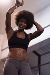 Image showing black woman doing dipping exercise