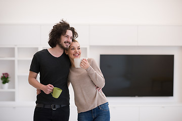 Image showing Happy couple in their new home