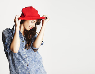 Image showing young cheerful brunette teenage girl on white background