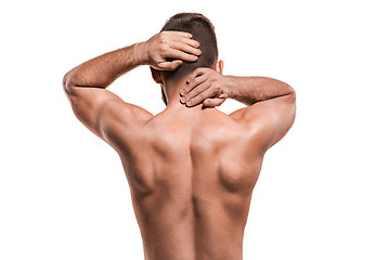 Image showing Studio shot of man with pain in neck