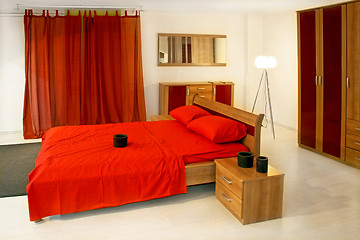 Image showing Big red bed