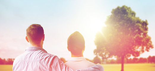 Image showing close up of happy male gay couple hugging