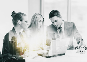 Image showing business team with laptop having meeting at office