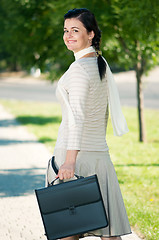 Image showing Business woman in summer park