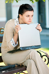 Image showing Business woman in summer park