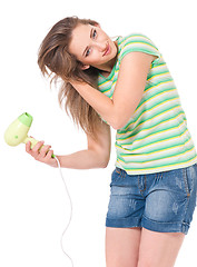Image showing Teen girl with hair dryer