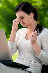 Image showing Business woman in summer park