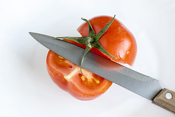 Image showing Knife and cut tomato