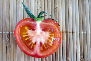 Image showing Slice of ripe tomato