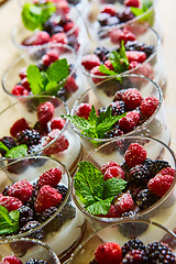 Image showing Blackberry and raspberry in the white yogurt.