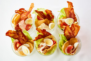 Image showing Caesar Salad, served in glass.