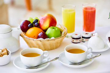 Image showing delicious breakfast for two at the luxury hotel.