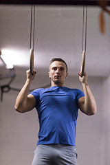 Image showing man doing dipping exercise