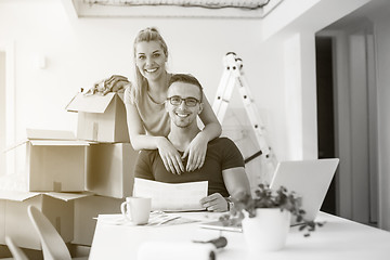 Image showing Young couple moving in a new home