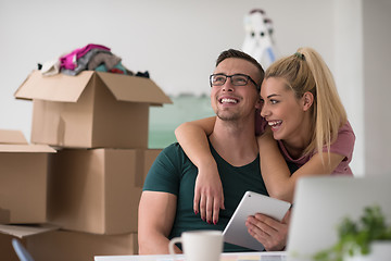 Image showing Young couple moving in a new home