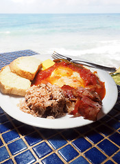 Image showing huevos rancheros eggs with rice beans gallo pinto as seen in Cor