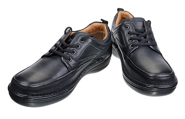 Image showing The black man\'s shoes