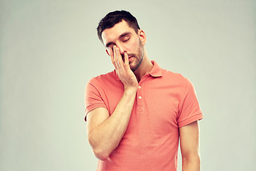 Image showing young man suffering from headache