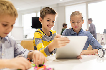 Image showing kids with tablet pc programming at robotics school