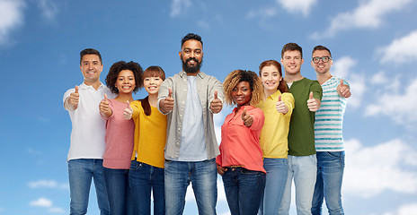 Image showing international group of people showing thumbs up