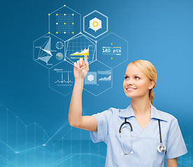 Image showing doctor pointing finger to virtual chart over blue