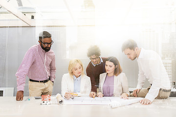 Image showing business team discussing house project at office