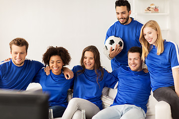 Image showing friends or football fans watching soccer at home