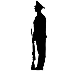 Image showing Black silhouette soldier is standing with arms on parade