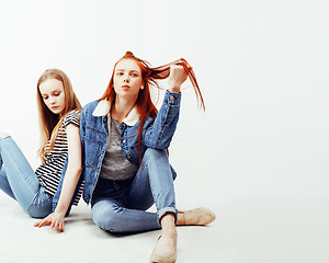 Image showing best friends teenage girls together having fun, posing emotional on white background, besties happy smiling, lifestyle people concept 